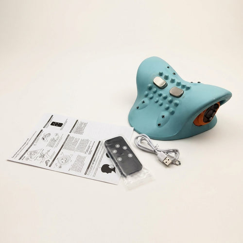 Cervya Triple-Therapy Pillow package contents: the pillow, printed manual, wireless remote and USB charging cable