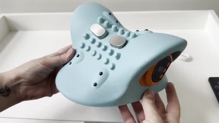Customer using the Cervya neck massager