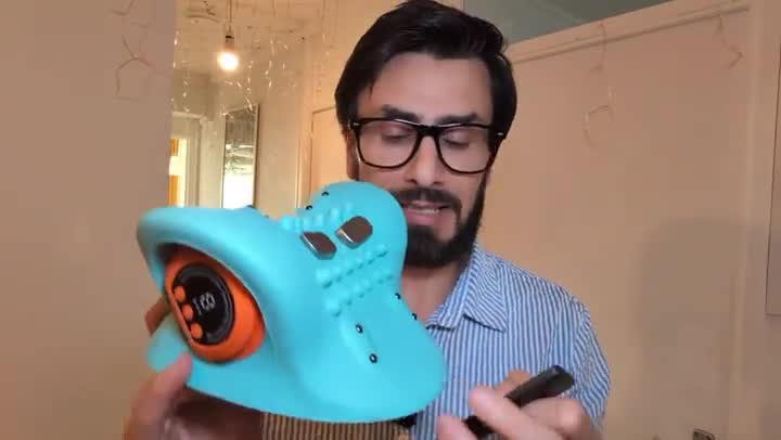 Customer using the Cervya neck massager